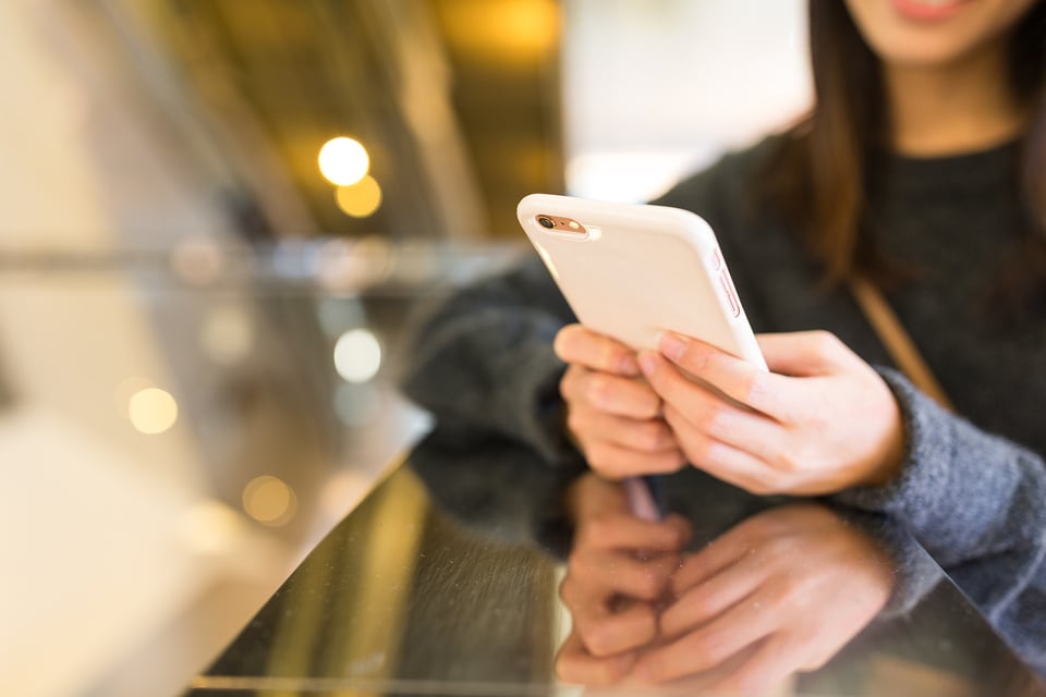 Woman Sending Text Message 